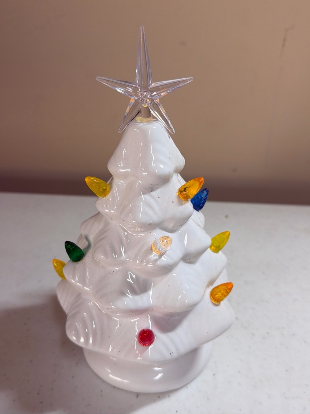 White Ceramic Light-Up Holiday Tree with Multicolor Bulbs and Star Topper